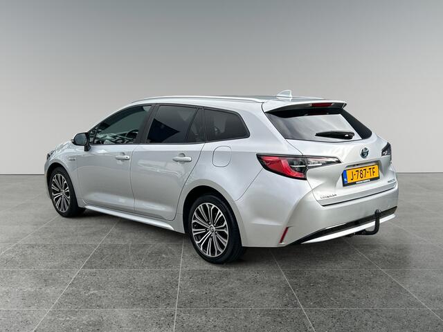 Toyota COROLLA Touring Sports 1.8 Hybrid Dynamic | incl. 12 maanden garantie | Trekhaak | Keyless entry | Stoelverwarming | LED koplampen | Achteruitrijcamera | Navigatie via Carplay | Draadloze telefoonlader | Bluetooth handsfree |