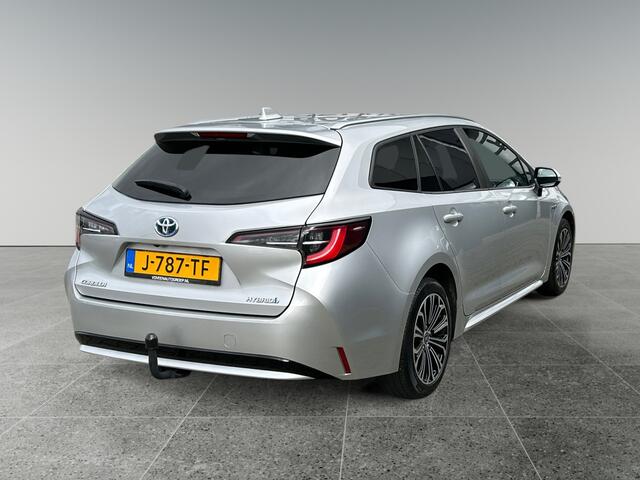 Toyota COROLLA Touring Sports 1.8 Hybrid Dynamic | incl. 12 maanden garantie | Trekhaak | Keyless entry | Stoelverwarming | LED koplampen | Achteruitrijcamera | Navigatie via Carplay | Draadloze telefoonlader | Bluetooth handsfree |