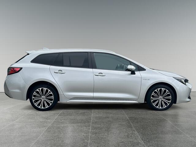 Toyota COROLLA Touring Sports 1.8 Hybrid Dynamic | incl. 12 maanden garantie | Trekhaak | Keyless entry | Stoelverwarming | LED koplampen | Achteruitrijcamera | Navigatie via Carplay | Draadloze telefoonlader | Bluetooth handsfree |