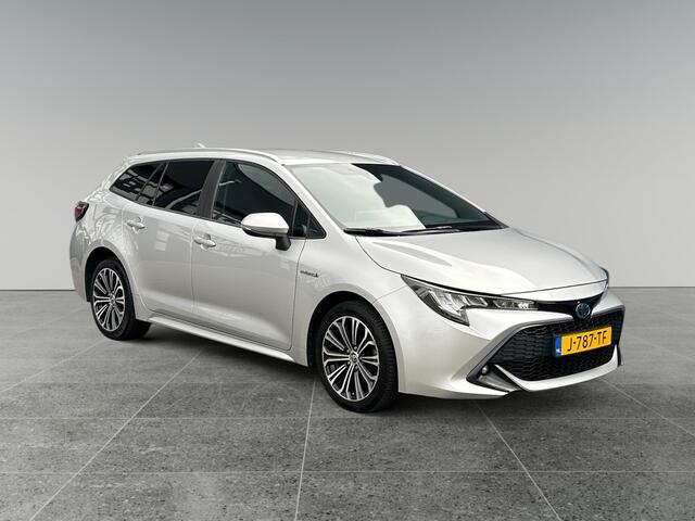 Toyota COROLLA Touring Sports 1.8 Hybrid Dynamic | incl. 12 maanden garantie | Trekhaak | Keyless entry | Stoelverwarming | LED koplampen | Achteruitrijcamera | Navigatie via Carplay | Draadloze telefoonlader | Bluetooth handsfree |