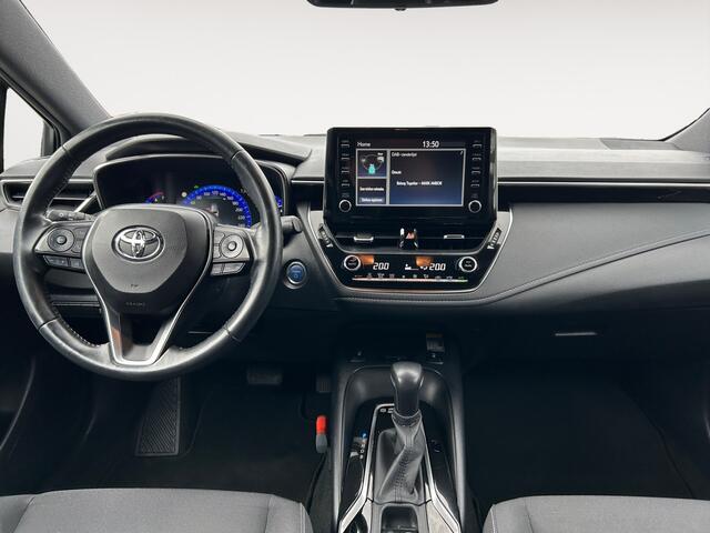 Toyota COROLLA Touring Sports 1.8 Hybrid Dynamic | incl. 12 maanden garantie | Trekhaak | Keyless entry | Stoelverwarming | LED koplampen | Achteruitrijcamera | Navigatie via Carplay | Draadloze telefoonlader | Bluetooth handsfree |