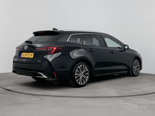 Toyota COROLLA Touring Sports Hybrid 140 Dynamic Limited | Parkeersensoren | Camera | Climate Control | Stoel en stuurwiel verwarmd | Half leder | LM velgen | Draadloze telefoonlader |