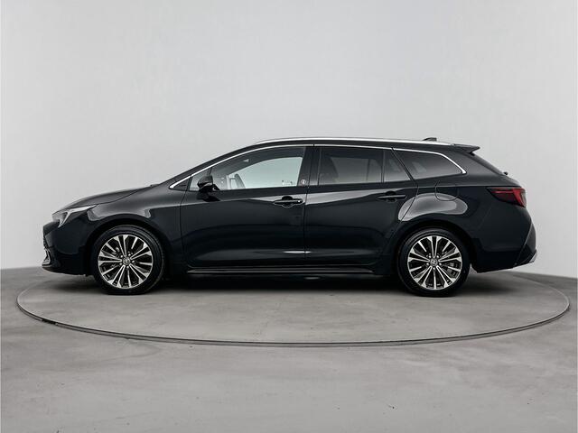 Toyota COROLLA Touring Sports Hybrid 140 Dynamic Limited | Parkeersensoren | Camera | Climate Control | Stoel en stuurwiel verwarmd | Half leder | LM velgen | Draadloze telefoonlader |