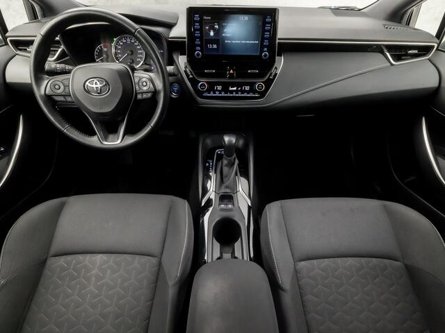 Toyota COROLLA Touring Sports 1.8 Hybrid Active Sport Automaat (NAVIGATIE, CAMERA, ADAPTIVE CRUISE, SPORTSTOELEN, LANE ASSIST, LED KOPLAMPEN, ZWART HEMEL, NIEUWSTAAT)