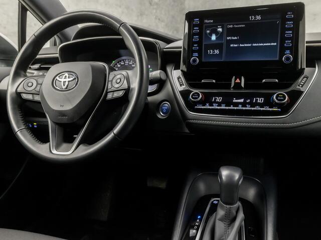 Toyota COROLLA Touring Sports 1.8 Hybrid Active Sport Automaat (NAVIGATIE, CAMERA, ADAPTIVE CRUISE, SPORTSTOELEN, LANE ASSIST, LED KOPLAMPEN, ZWART HEMEL, NIEUWSTAAT)