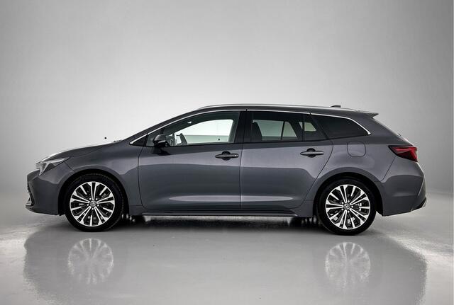 Toyota COROLLA Touring Sports Hybrid 200 First Edition | Elektrisch bedienbare achterklep | Voorruit verwarming | Stuurwiel verwarming |