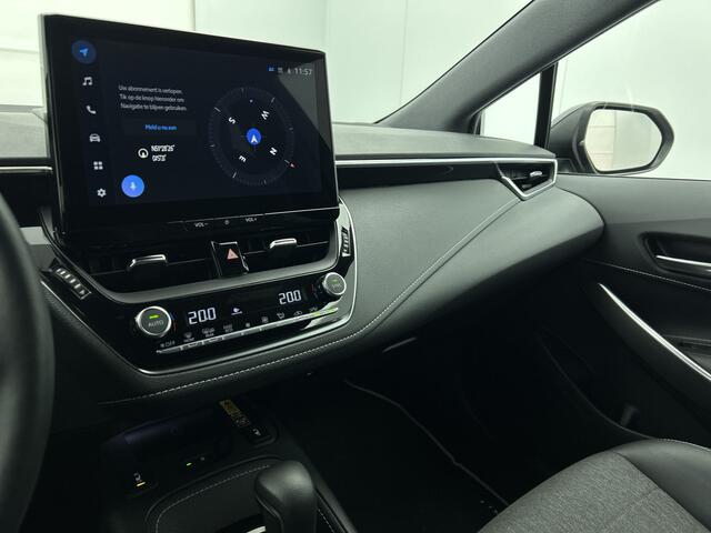 Toyota COROLLA Touring Sports Hybrid 200 First Edition | Elektrisch bedienbare achterklep | Voorruit verwarming | Stuurwiel verwarming |