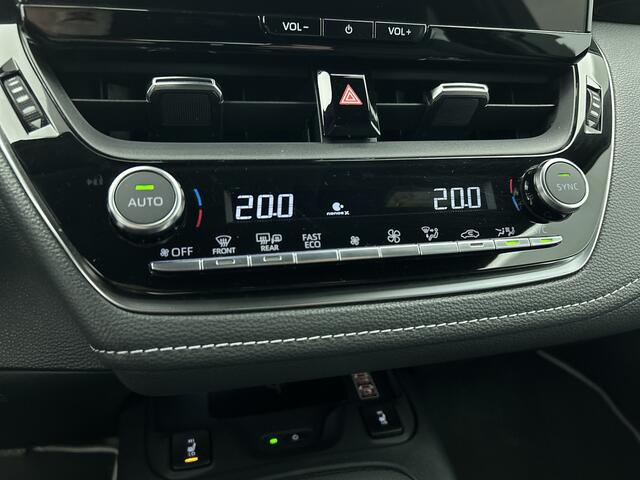 Toyota COROLLA Touring Sports Hybrid 200 First Edition | Elektrisch bedienbare achterklep | Voorruit verwarming | Stuurwiel verwarming |