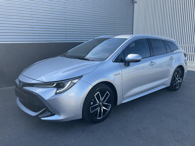 Toyota COROLLA Touring Sports 1.8 Hybrid Style Stoelverwarming, Achteruitrij camera, Elektr. bedienbare achterklep, Draadloze telefoonlader, Apple carplay en/of Android auto, LMV, Privacy glass