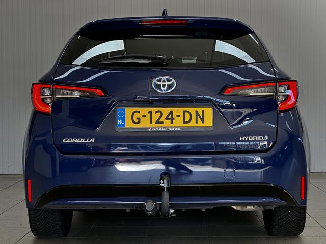Toyota COROLLA Touring Sports 1.8 Hybrid First Edition/ Automaat/ Trekhaak/ Camera/ Zwarte-Hemel/ LED Koplampen/ Mirror-Link/ 17'' LMV/ Lane-Assist./ Grootlicht Assist./ Navi/ Cruise/ Bluetooth/ Multi. LEDER. Stuur/ LED Mistl./ Dakrails.