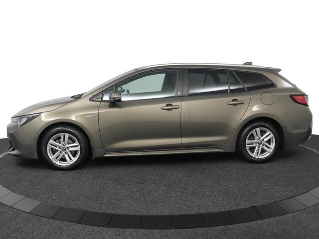 Toyota COROLLA Touring Sports 1.8 Hybrid Dynamic Limited | Apple Carplay/Android Auto | Elektrische Achterklep | Stoel/Stuurverwarming | head-up display |