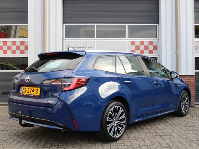 Toyota COROLLA Touring Sports 1.8 Hybrid First Edition /NAVI/PDC/Trekhaak/Regensensor/Camera/Apple carplay/DAB+/ACC/17'LM/NAP! 1e eig!