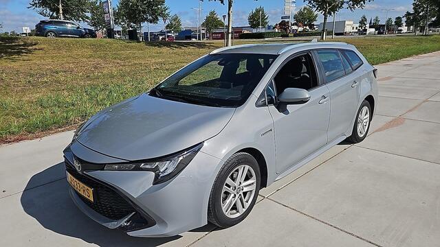 Toyota COROLLA Touring Sports 1.8 HYBRID BUSINESS BI-TONE GARANTIE 10-2030! 1e EIG.CARPLAY NAVIGATIE .CAMERA.BIJNA 2021!