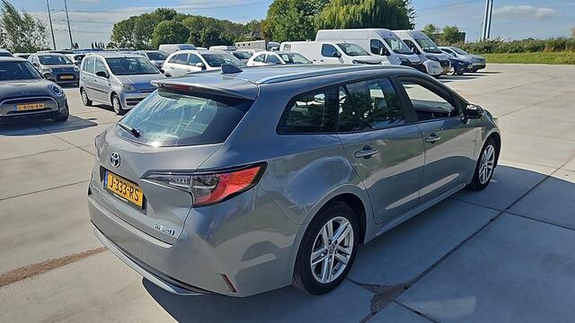 Toyota COROLLA Touring Sports 1.8 HYBRID BUSINESS BI-TONE GARANTIE 10-2030! 1e EIG.CARPLAY NAVIGATIE .CAMERA.BIJNA 2021!