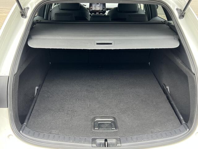 Toyota COROLLA Touring Sports 1.8 Hybrid Business Plus Navigatie* Carplay Camera Keyless Led Stoelverwarming ACC Dab 17 Inch Velgen Getint Glas NL Auto Wit Metallic