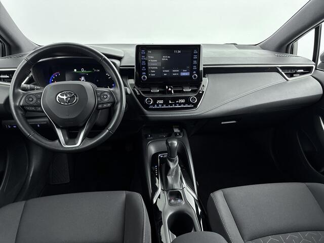 Toyota COROLLA Touring Sports 1.8 Hybrid Dynamic | 1E Eig! | Parkeercamera Achter | Stoelverwarming | Draadloze Telefoonlader | 17'' Lichtmetalen Velgen | Apple Carplay/Android Auto |