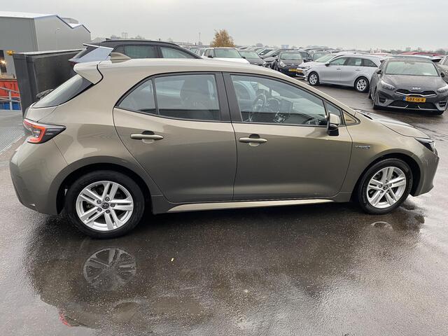 Toyota COROLLA 1.8 Hybrid Active NL Auto, 1e eign. BTW-auto, Navigatie Apple CarPlay/Android Auto, achteruitrij camera, adaptieve cruise control, keyless, boekjes compleet