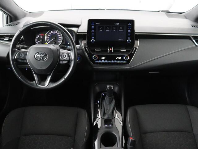 Toyota COROLLA 1.8 Hybrid Business | Trekhaak | Camera | Adaptive cruise | Carplay | Full LED | Climate control | Bluetooth | DAB | Getint glas