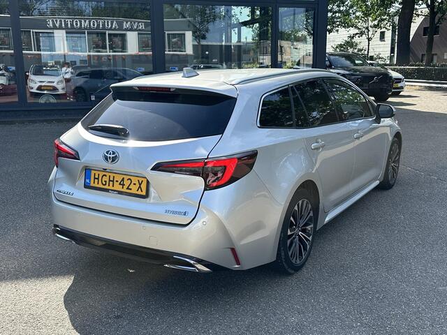Toyota COROLLA Touring Sports Hybrid 140 Business Plus VAN ¤29.900 VOOR ¤27.877 | UW WK-VOORDEEL ¤2.023| TOYOTA GARANTIE T/M 2034| AFNEEMBARE TREKHAAK| CAMERA| STOEL + STUURVERWARMING| VOORRUITVERWARMING|