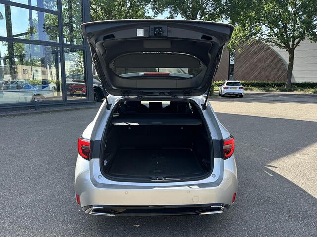 Toyota COROLLA Touring Sports Hybrid 140 Business Plus VAN ¤29.900 VOOR ¤27.877 | UW WK-VOORDEEL ¤2.023| TOYOTA GARANTIE T/M 2034| AFNEEMBARE TREKHAAK| CAMERA| STOEL + STUURVERWARMING| VOORRUITVERWARMING|