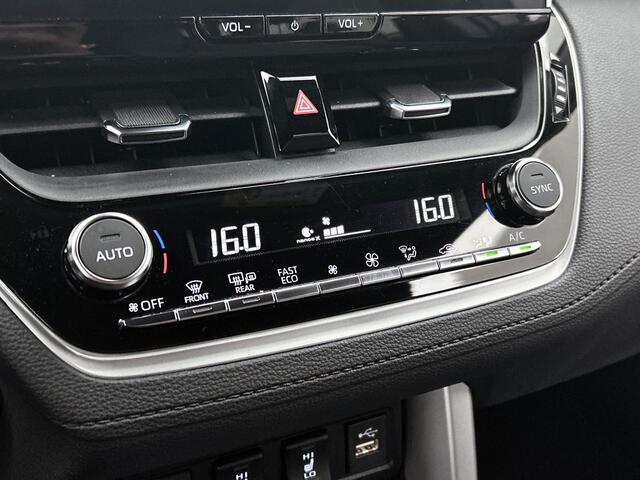 Toyota COROLLA Cross 2.0 High Power Hybrid First Edition | Stoelverwarming | Dealeronderhoud | Half Leder / Stof |
