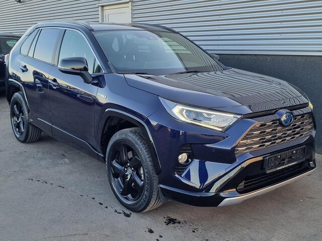 Toyota RAV4 2.5 Hybrid AWD Bi-Tone | Elek. bedienbare achterklep | Keyless entry- & start | Stoelverwarming | Lederen interieur | Elek. bedienbare buitenspiegels | Parkeersensoren v&a |