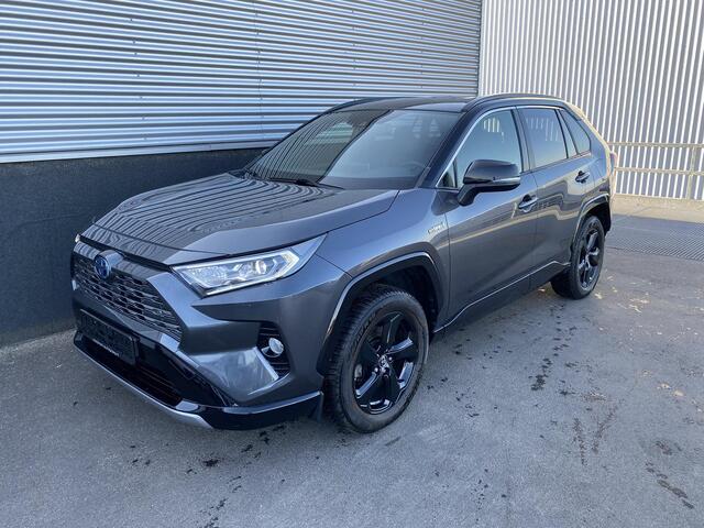 Toyota RAV4 2.5 Hybrid Bi-Tone | Zwart dak | Zwarte velgen | Lederen bekleding | Adaptive cruise control | Elektr. Bedienbare achterklep | Stoelverwarming | Elektr. inklapbare buitenspiegels | Achteruitrij camera |