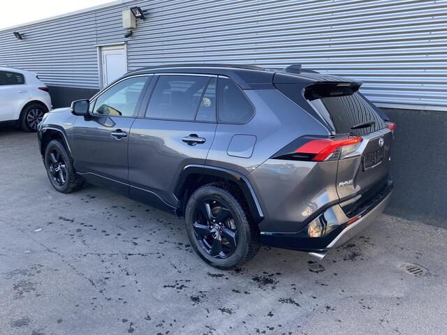 Toyota RAV4 2.5 Hybrid Bi-Tone | Zwart dak | Zwarte velgen | Lederen bekleding | Adaptive cruise control | Elektr. Bedienbare achterklep | Stoelverwarming | Elektr. inklapbare buitenspiegels | Achteruitrij camera |