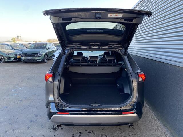 Toyota RAV4 2.5 Hybrid Bi-Tone | Zwart dak | Zwarte velgen | Lederen bekleding | Adaptive cruise control | Elektr. Bedienbare achterklep | Stoelverwarming | Elektr. inklapbare buitenspiegels | Achteruitrij camera |