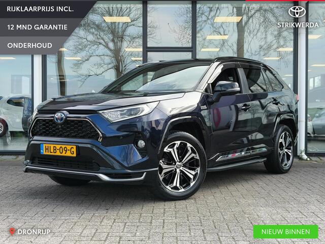 Toyota RAV4 2.5 Plug-in Hybrid AWD Bi-Tone Plus | JBL | Leer | Stoel koeling & verwarming | Trekhaak | BSM | Navi | Zeer compleet!