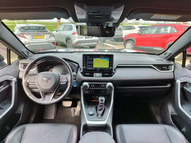 Toyota RAV4 2.5 Plug-in Hybrid AWD Bi-Tone Plus | JBL | Leer | Stoel koeling & verwarming | Trekhaak | BSM | Navi | Zeer compleet!