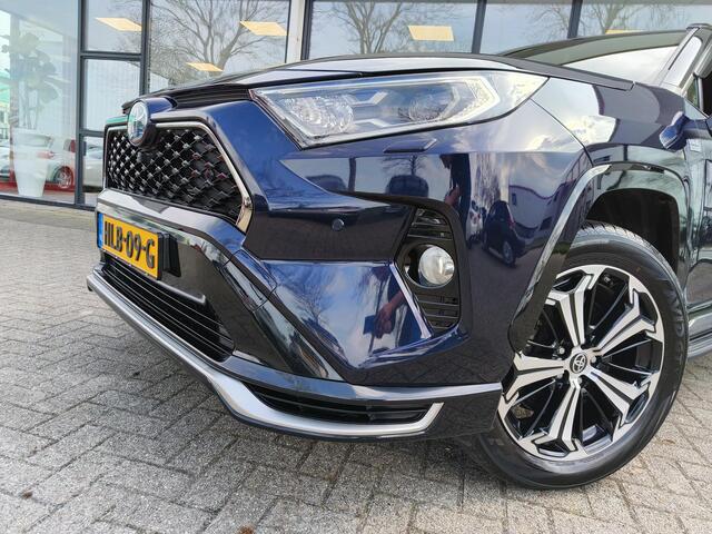 Toyota RAV4 2.5 Plug-in Hybrid AWD Bi-Tone Plus | JBL | Leer | Stoel koeling & verwarming | Trekhaak | BSM | Navi | Zeer compleet!