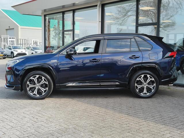 Toyota RAV4 2.5 Plug-in Hybrid AWD Bi-Tone Plus | JBL | Leer | Stoel koeling & verwarming | Trekhaak | BSM | Navi | Zeer compleet!