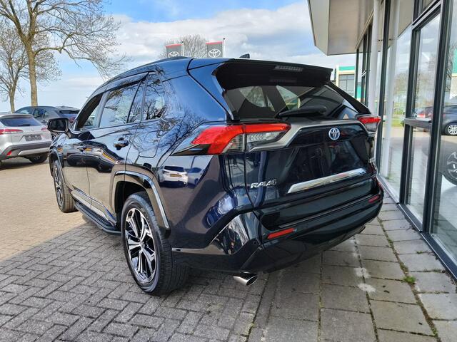 Toyota RAV4 2.5 Plug-in Hybrid AWD Bi-Tone Plus | JBL | Leer | Stoel koeling & verwarming | Trekhaak | BSM | Navi | Zeer compleet!
