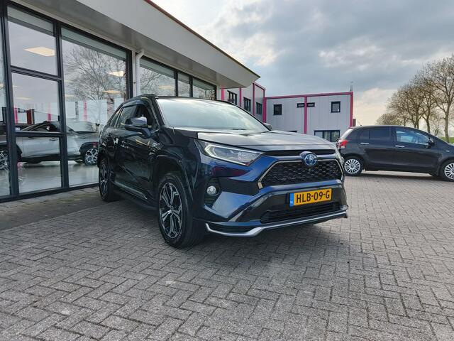 Toyota RAV4 2.5 Plug-in Hybrid AWD Bi-Tone Plus | JBL | Leer | Stoel koeling & verwarming | Trekhaak | BSM | Navi | Zeer compleet!
