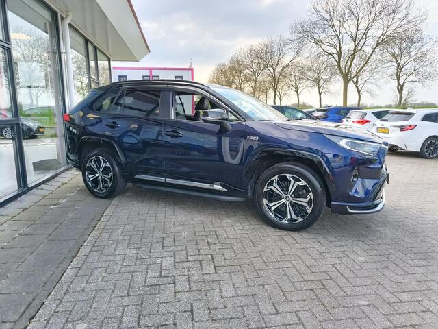 Toyota RAV4 2.5 Plug-in Hybrid AWD Bi-Tone Plus | JBL | Leer | Stoel koeling & verwarming | Trekhaak | BSM | Navi | Zeer compleet!
