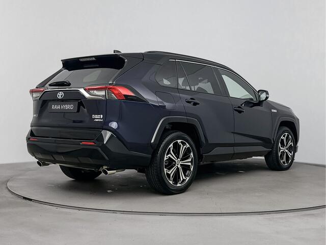 Toyota RAV4 2.5 Plug-in Hybrid AWD Bi-Tone Plus | Glazen Panoramadak | Stoelventilatie -/ Verwarming |