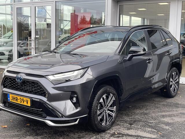 Toyota RAV4 2.5 Plug-in Hybrid AWD Bi-Tone Plus Schuif-/kanteldak | Lederen bekleding | JBL Premium geluid | Dodehoekdetectie