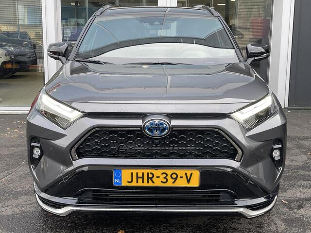 Toyota RAV4 2.5 Plug-in Hybrid AWD Bi-Tone Plus Schuif-/kanteldak | Lederen bekleding | JBL Premium geluid | Dodehoekdetectie