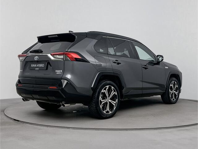 Toyota RAV4 2.5 Plug-in Hybrid AWD Bi-Tone Plus | Glazen Panoramadak | JBL-Audio | Stoelverwarming |