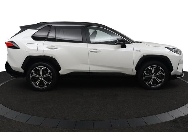Toyota RAV4 2.5 Plug-in Hybrid AWD Bi-Tone Plus | Trekhaak | JBL Audio | Led Verlichting | 360 Camera en Sensoren | Stoelverwarming en Verkoeling |