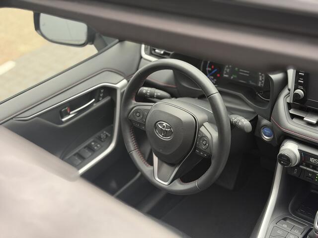 Toyota RAV4 2.5 Hybrid AWD Bi-Tone | GEEN AFLEVERKOSTEN | Schuif-/kanteldak, Head-up display, Rondomzicht camera