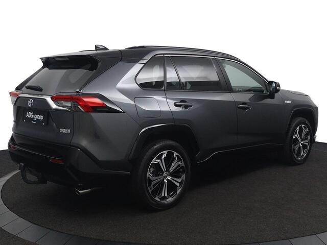 Toyota RAV4 2.5 Plug-in Hybrid AWD Bi-Tone Plus | Trekhaak | Lederenbekleding met Verwarming en Verkoeling | JBL Head Up Display | Elektrisch verstelbare bestuurdersstoel met geheugen |