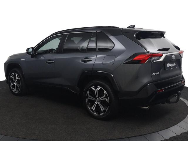 Toyota RAV4 2.5 Plug-in Hybrid AWD Bi-Tone Plus | Trekhaak | Lederenbekleding met Verwarming en Verkoeling | JBL Head Up Display | Elektrisch verstelbare bestuurdersstoel met geheugen |