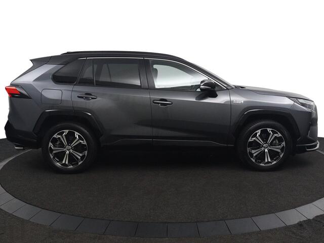 Toyota RAV4 2.5 Plug-in Hybrid AWD Bi-Tone Plus | Trekhaak | Lederenbekleding met Verwarming en Verkoeling | JBL Head Up Display | Elektrisch verstelbare bestuurdersstoel met geheugen |