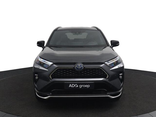 Toyota RAV4 2.5 Plug-in Hybrid AWD Bi-Tone Plus | Trekhaak | Lederenbekleding met Verwarming en Verkoeling | JBL Head Up Display | Elektrisch verstelbare bestuurdersstoel met geheugen |