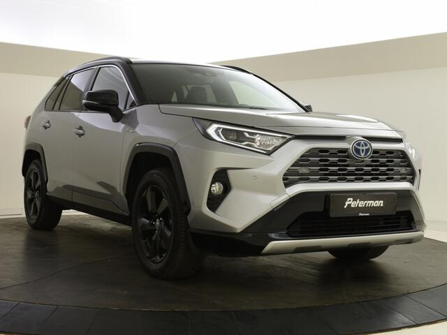Toyota RAV4 2.5 Hybrid AWD Style | Elektr. a. klep | PDC | Halfleer |