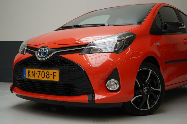 Toyota YARIS 1.5 Hybrid Orange Sport | Navigatie | Achteruitrijcamera | Climate control | Cruise control | Lm velgen
