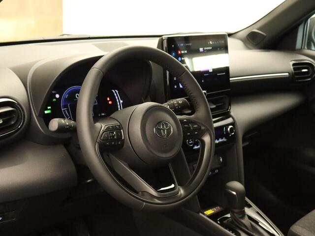 Toyota YARIS Cross 1.5 Hybrid 130 Dynamic - ADAPTIEVE CRUISE CONTROL - NAVIGATIE FULL MAP - APPLE CARPLAY/ANDROID AUTO - EXTRA GETINT GLAS - STUURWIELVERWARMING - STOELVERWARMING - DODEHOEKDETECTIE - CLIMATE CONTROL - KEYLESS ENTRY/START - PARKEERSENSOREN VOOR + ACHTE
