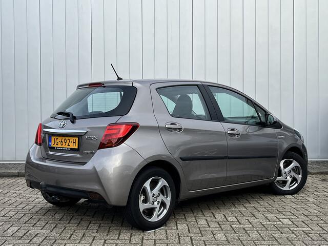 Toyota YARIS 1.5 Hybrid Lease Clima Cruise Trekhaak Dealer onderhouden NL auto!